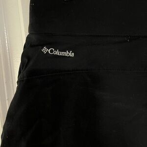 Black Columbia skort with adjustable ties. Size Medium